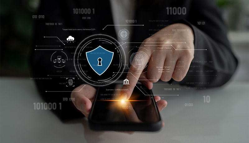 closeup of mobile phone with shield icon